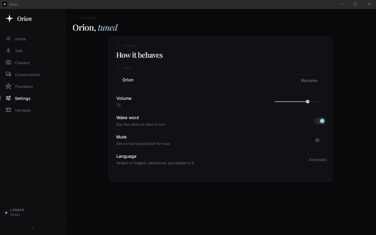 Settings: name, volume, wake word, mute, and the language, automatic between Arabic and English.